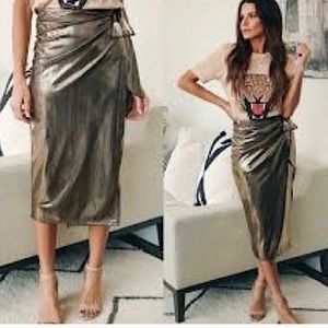 Metallic gold wrap skirt. New without tags.